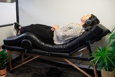 Patient doing PEMF therapy at Dr Marianne Neilsen Chiropractic Neurology in Los Gatos.