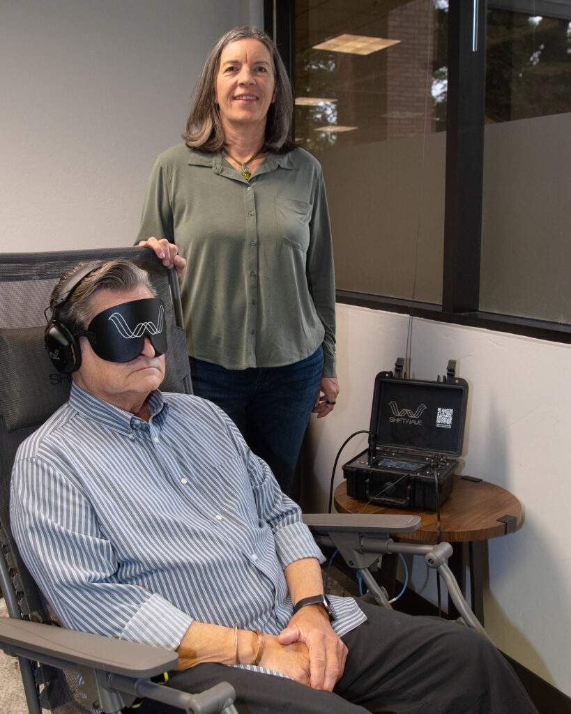 Dr. Marianne Nielsen and a client using the Shiftwave technology.